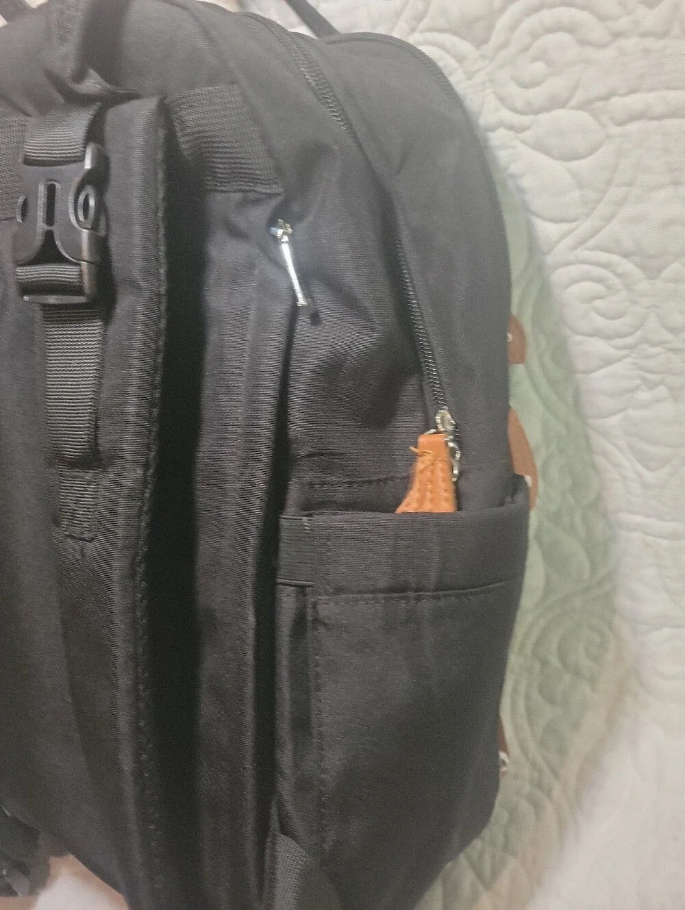 Black Quilted Backpack with Tan Accents